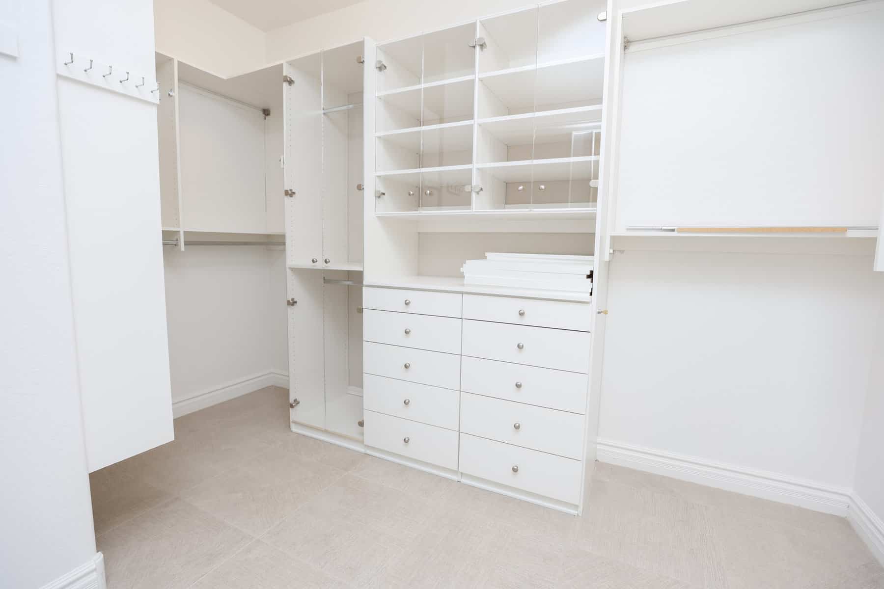 Large Closet with Drawers and Cabinets